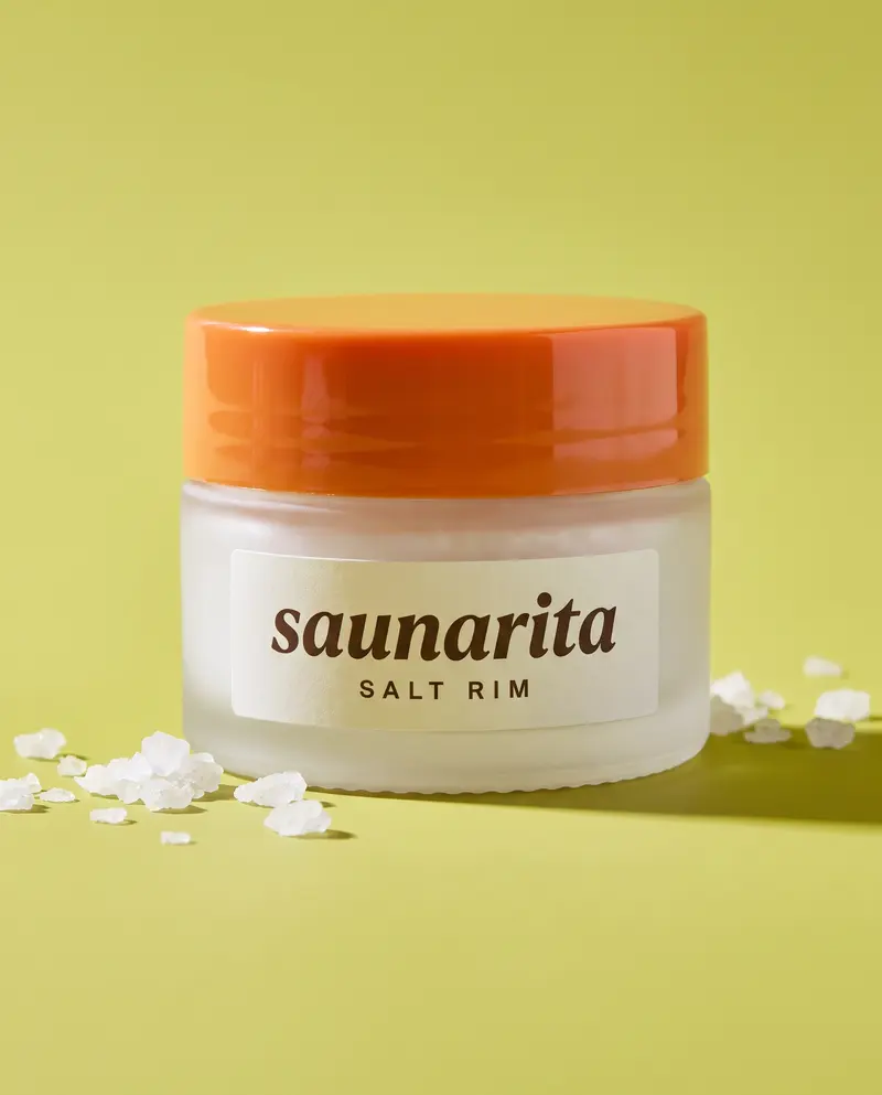 Salt Rim barrier balm jar with a tangerine lid